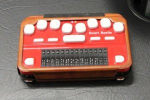 Red and White Smart Beetle Braille Machine