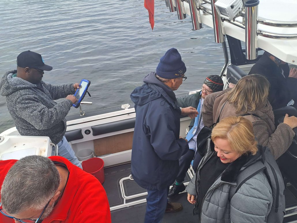 People on the boat getting ready to go