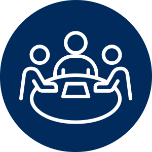 navy circle with an icon of three people sitting around a table