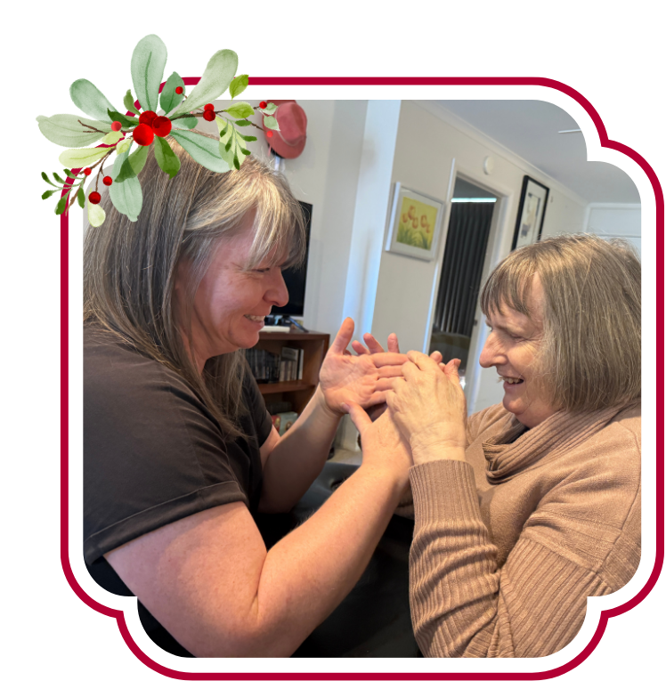 Michelle using tactile Auslan with her interpreter